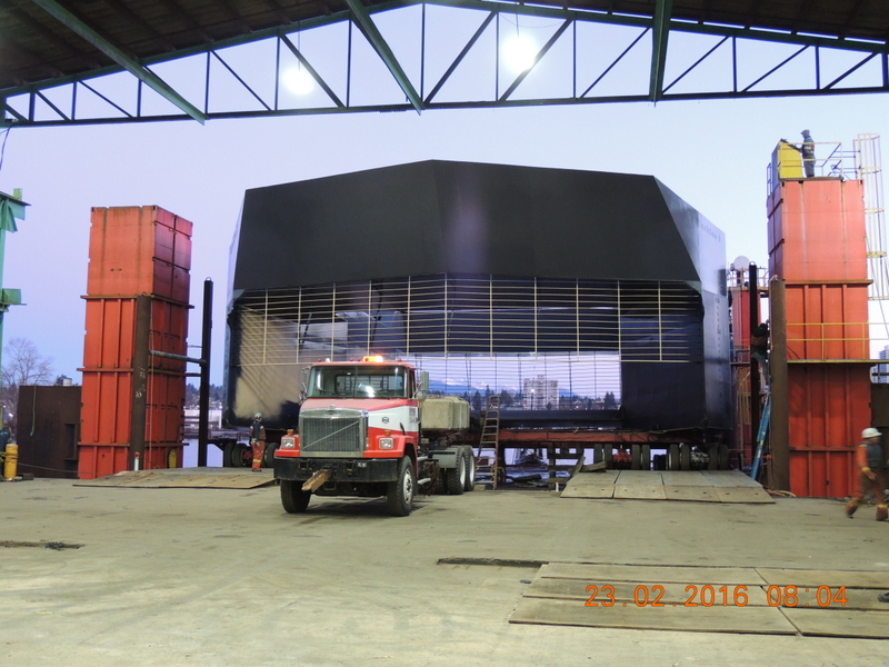Water Wall Turbine Inc.’s vessel being moved from the fabrication shop to dry dock before being tested in the Vancouver area. February 23, 2016.
