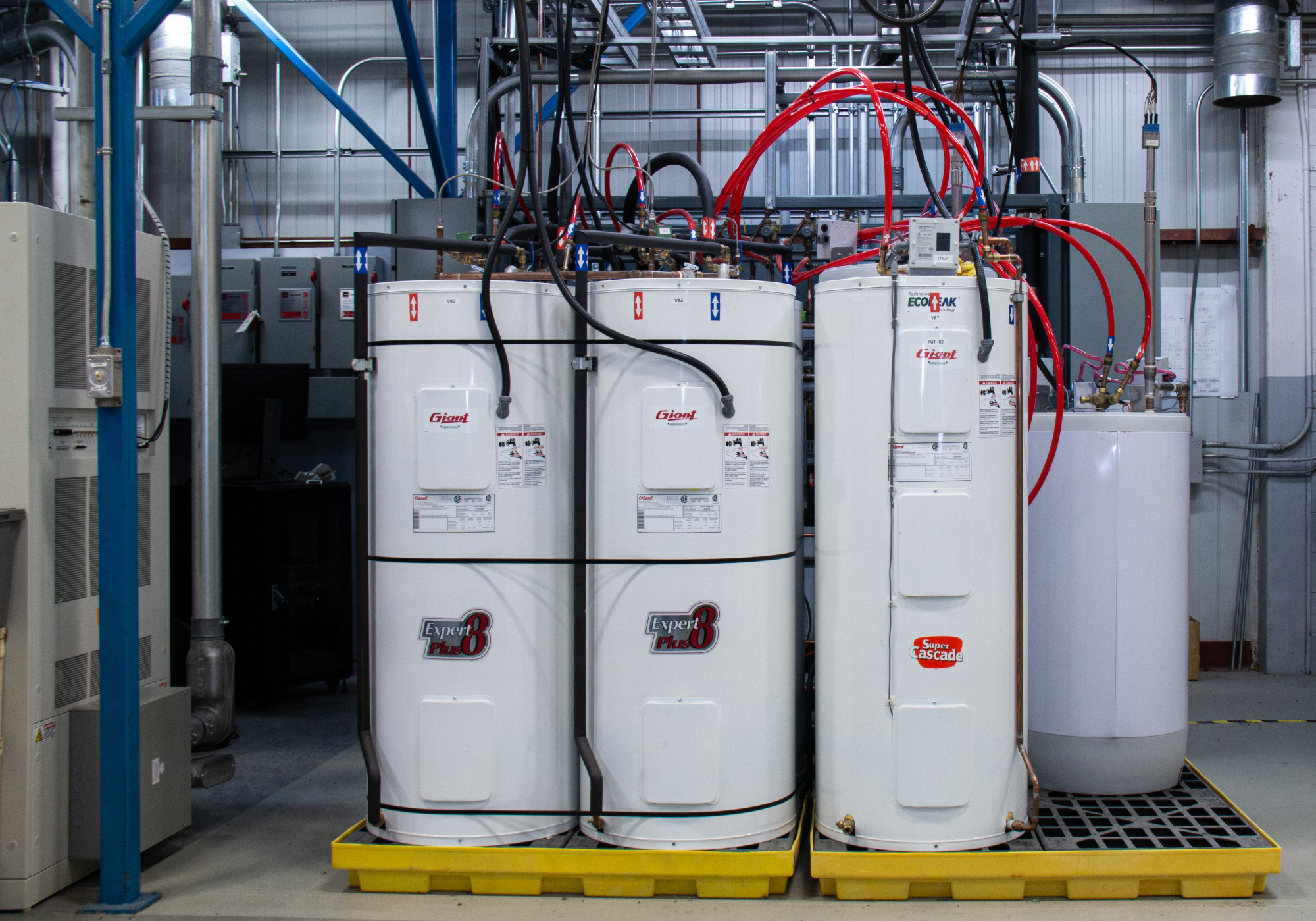 The image shows a view of the electric water heater test bench at CanmetENERGY in Varennes.