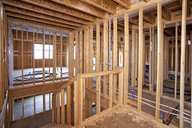 The interior of a residential house under construction showing softwood dimension lumber.