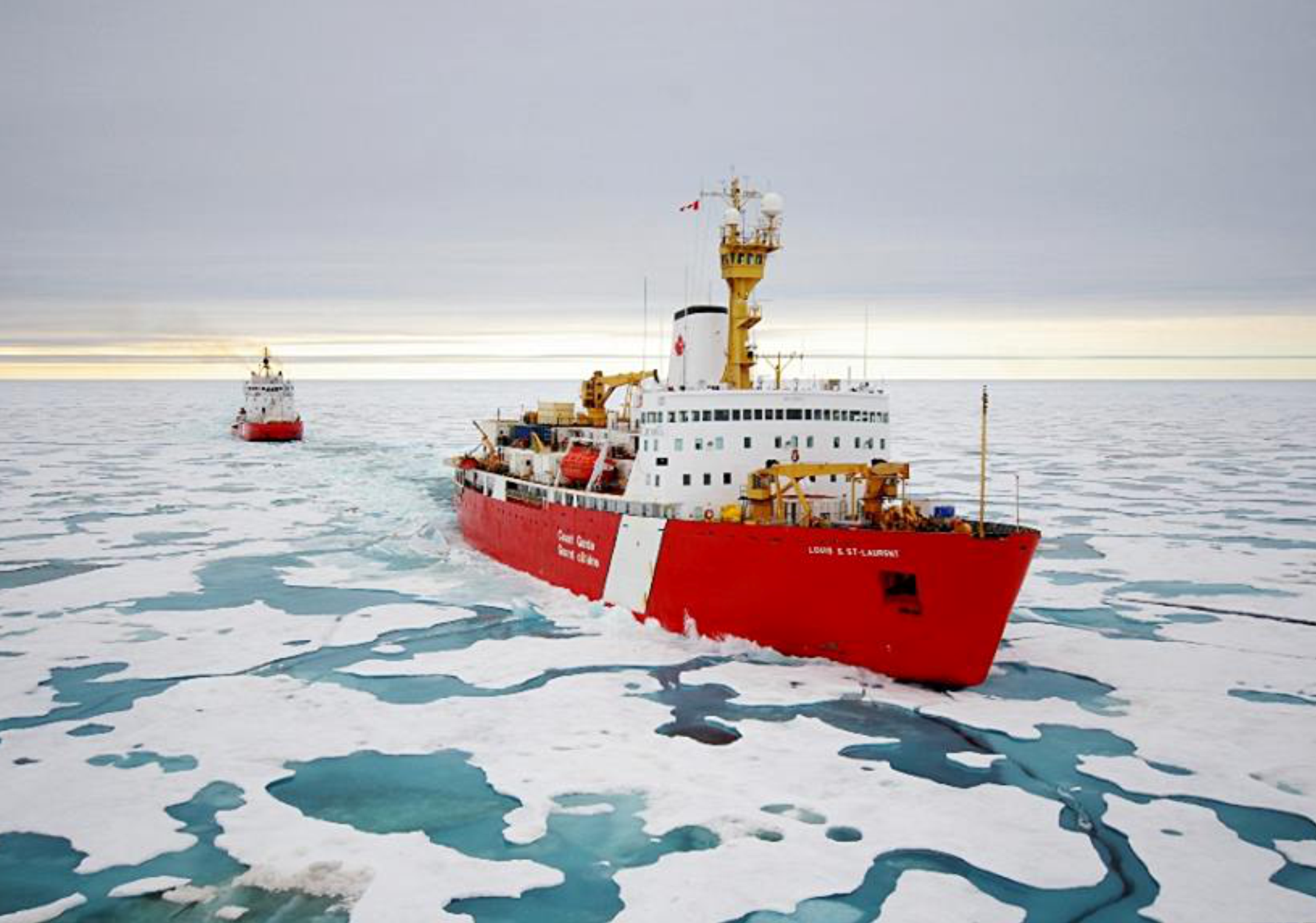 The CCGS Louis S St-Laurent (foreground) and the CCGS Terry Fox (following). A decade of research surveys were conducted from icebreakers to acquired geological and geophysical data to define Canada’s continental shelf in the Arctic Ocean.