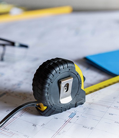 Tape measure on architectural plan