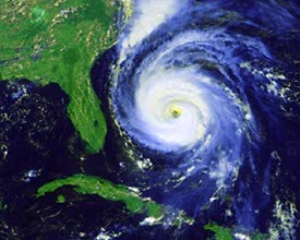 Image acquired by a GOES satellite covering the southeastern United States and parts of the Caribbean. The image is centered on a huge depression in the Atlantic. The purpose of the image is to show that weather satellites can observe large areas